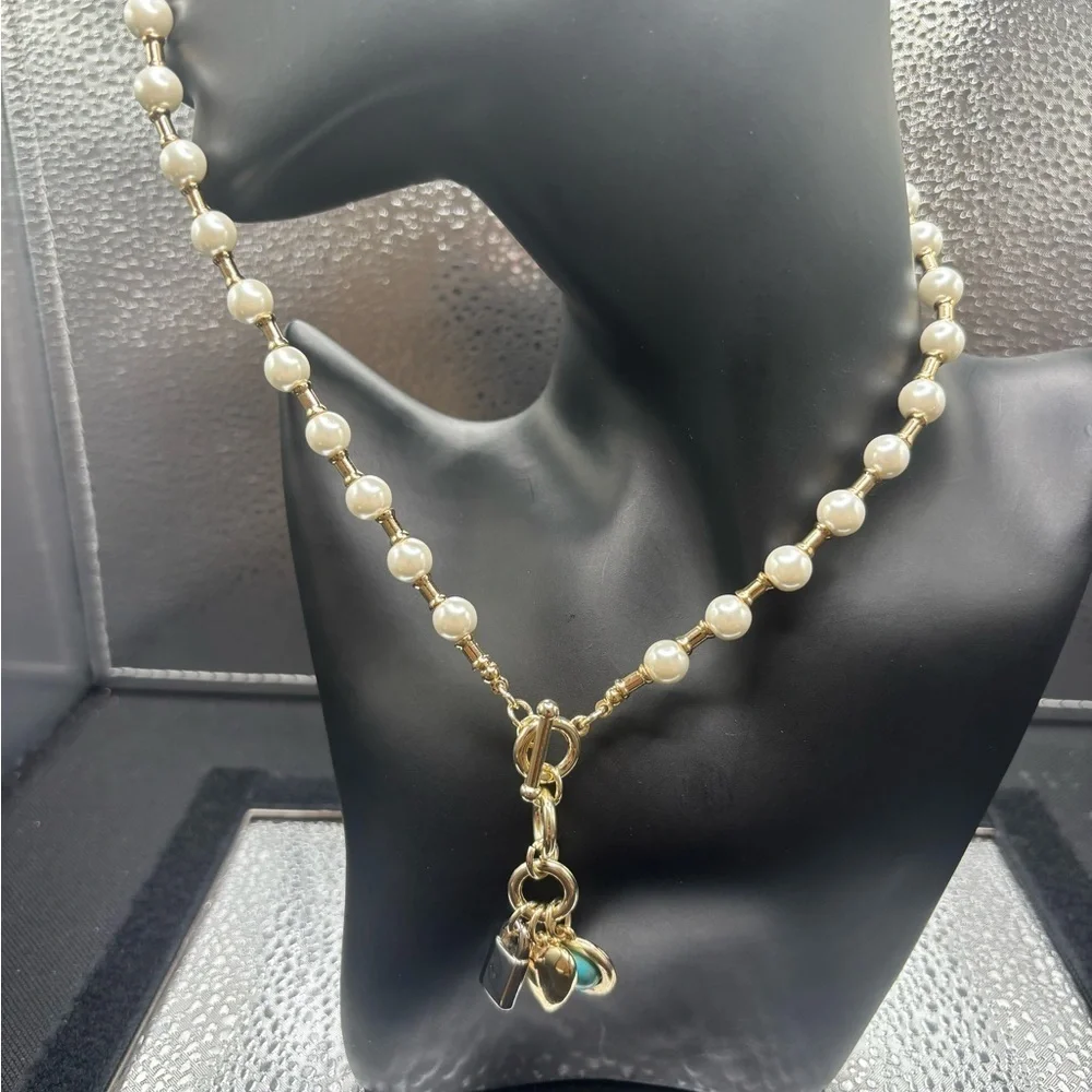 Elegant Pearl and Gold Necklace with Turquoise charm, a heart and a lock.